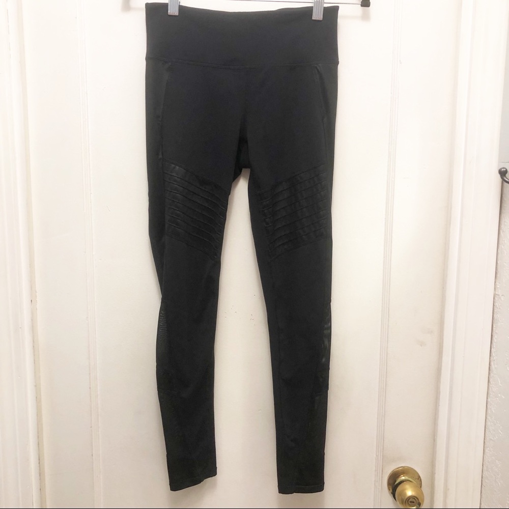 Athleta Motto Yoga Leggings With Mesh Side Panels. Mid-rise waist.